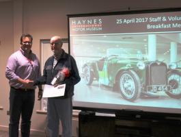 Keith Harrison receiving his 10 year award for Volunteering at Haynes International Motor Museum